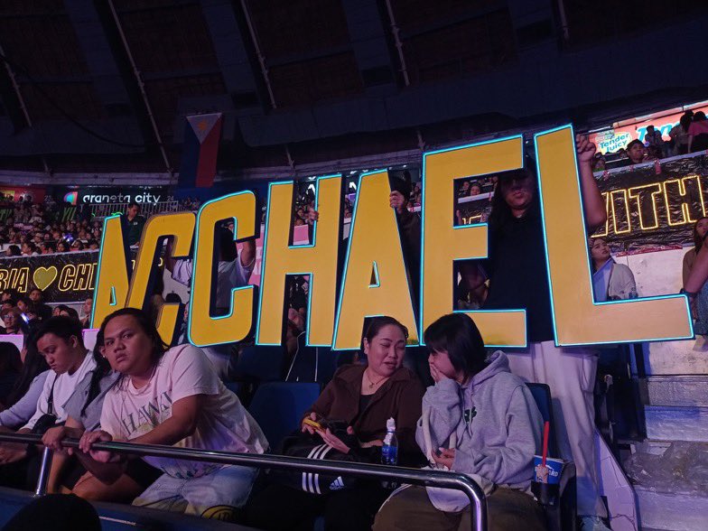AcChaelGlobal's tweet photo. We made it. We were there. 🥹 Nakakaiyak to see our LED letters glowing at Araneta — our love lit up for Ac and Michael. We hope you saw it, and felt every bit of it. 💙💛

#AcChael | #AcBonifacio | #MichaelSager 
#pbbcolloveconcert https://t.co/VRnvBJ8Rmn