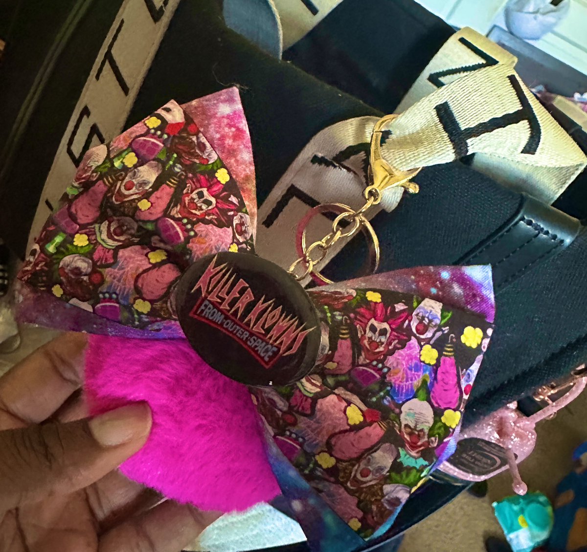 Going to see “Weapons” with the OG final girl aka my mama and I made a cute little horror charm out of my Etsy bow for my purse