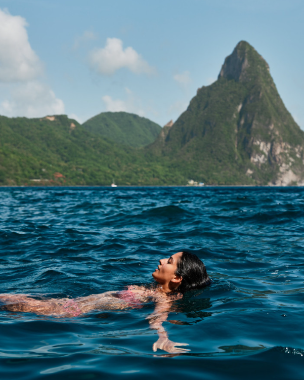 Travel_StLucia's tweet image. Framed by the Pitons, she finds her calm in #SaintLucia’s surrounded by the most iconic view. #LetHerInspireYou #TravelSaintLucia
