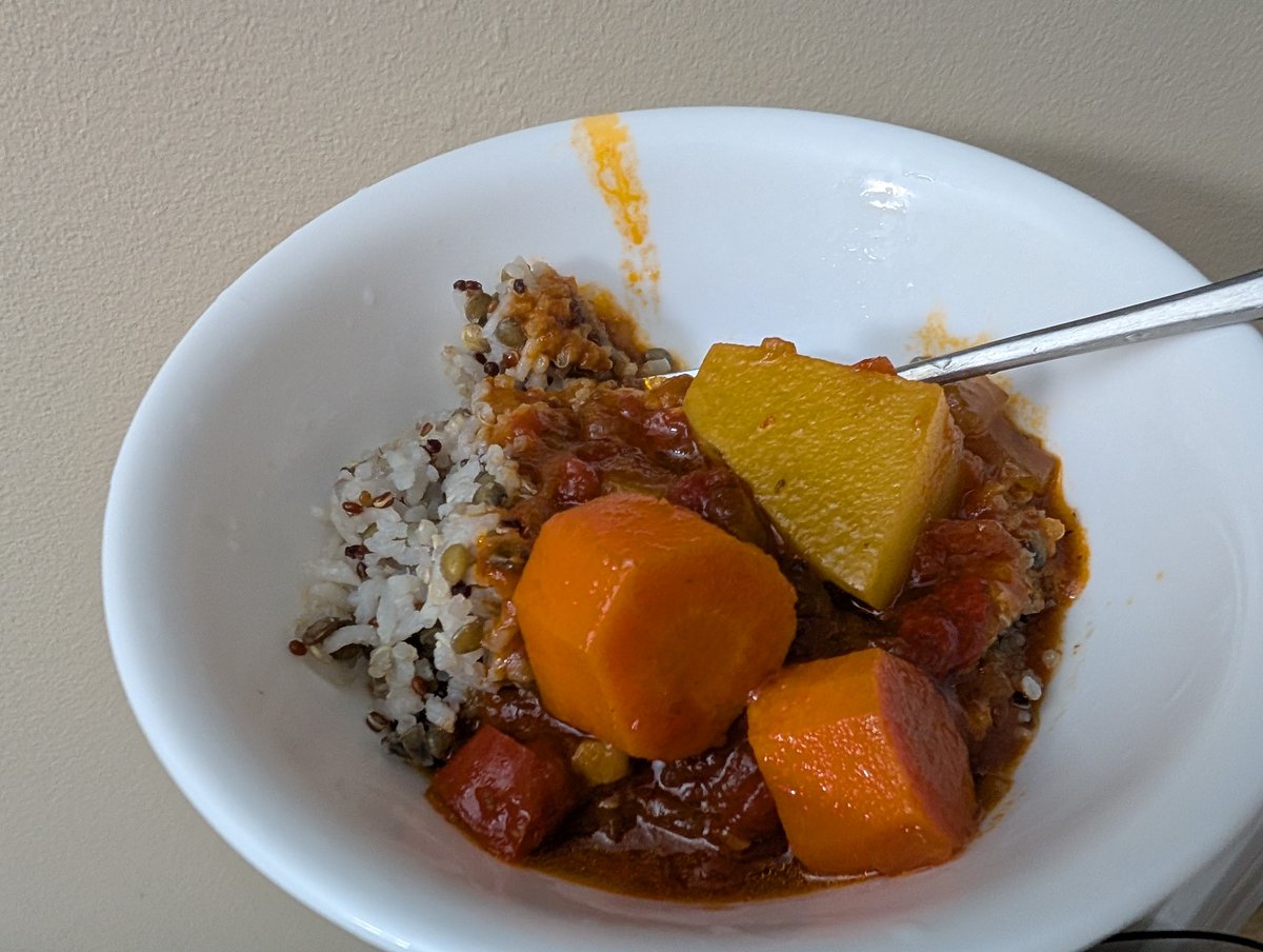 Beef kaldereta on rice, lentils and quinoa.