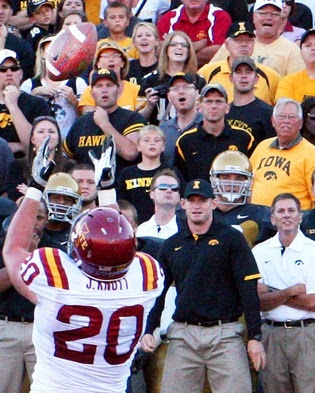 Pick a different Iowa fan to look at every time you see the picture. Endless entertainment.