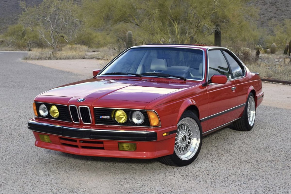 horsepower's tweet photo. Here is a beautiful 1988 BMW M6 (E24) for sale in Arizona. This example is finished in Cinnabar Red on the exterior with a Lotus White interior. The car has around 81,300 miles on the odometer and comes with an asking price of $61,500. https://t.co/LtTP2DIRru