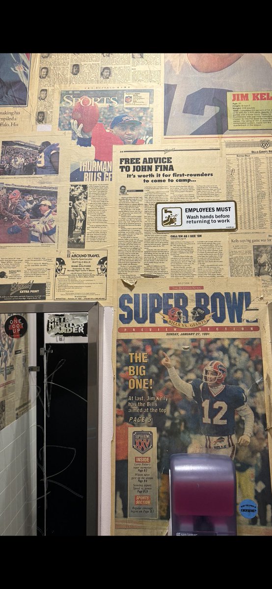 mdevine29's tweet image. In a bar on Elmwood Ave in Buffalo and I saw this  newspaper headline on the bathroom wall @JohnFina