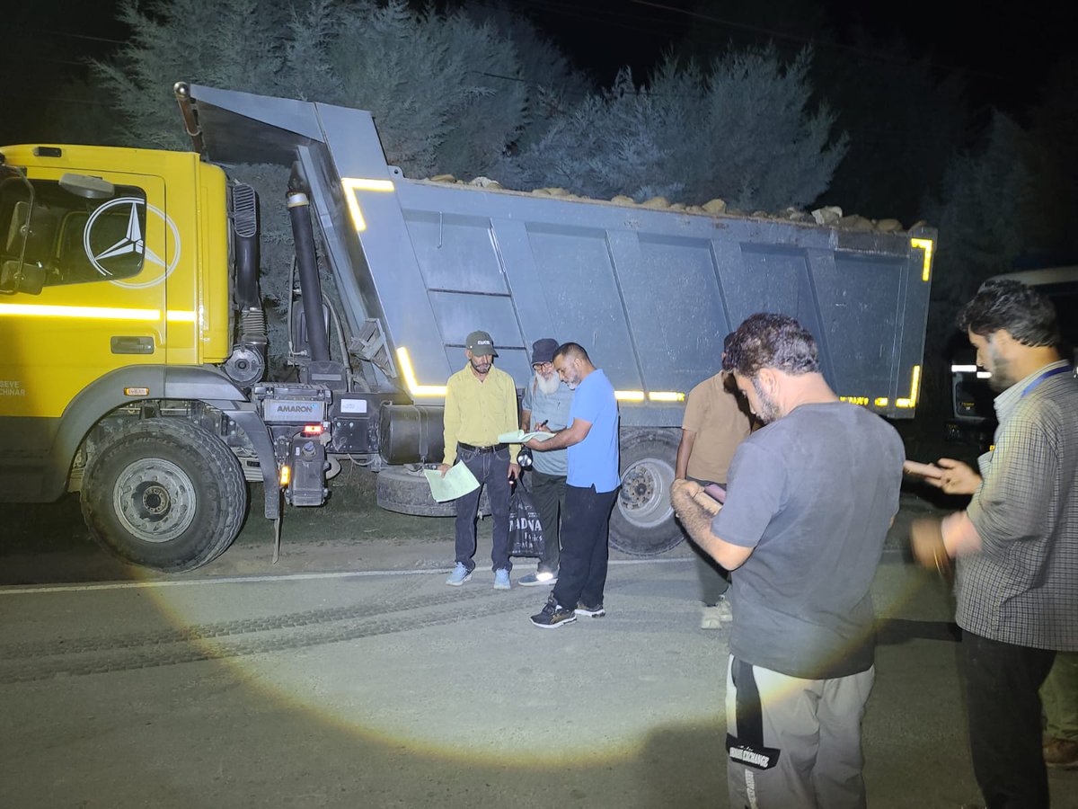 An illegal Dump Material and Nine (09) vehicles seized during nocturnal raid in Pulwama. 
Continuing the deterrence in illegal mining the team of mining headed by the DMO, seized 09 Nine vehicles and an  illegal  Dump of Boulders.The action was carried on directions of Worthy