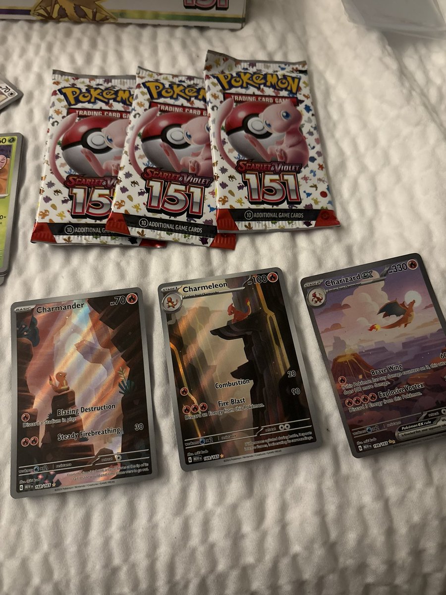 cenclack's tweet photo. I opened one pack of 151 in a Zapdos box and 🤯 https://t.co/EwF9Q0tEOt
