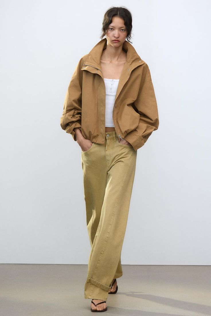 TufaniHoney's tweet photo. Tube top, khaki flow, and a jacket that does all the talking 🧥☁️ Easy layers, clean lines—this is my kind of casual. #RealFashion #EffortlessStyle #DailyOutfit #NeutralVibes #StyleInMotion #ModernMinimal #SoftStructure https://t.co/9ln6lejyRD