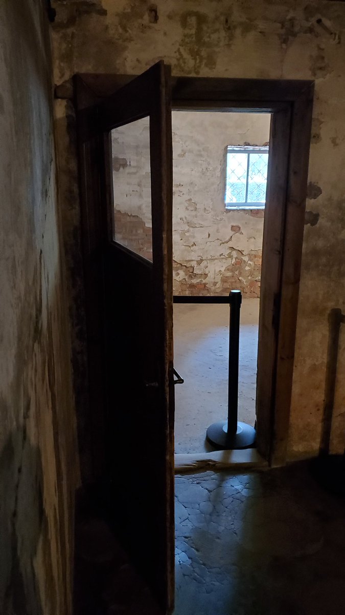 benwehrman's tweet photo. I went and saw the wooden gas chamber door myself while traveling in Krakow recently.

Couple new things I learned:

1) Not only is the door made of wood, locks from the inside, and has a giant window...the room itself has a huge window! (see pic)

2) The Nazi guard living barracks are RIGHT NEXT TO THIS BUILDING. I guess they didn't mind having a little poison gas waft into their windows in the morning?