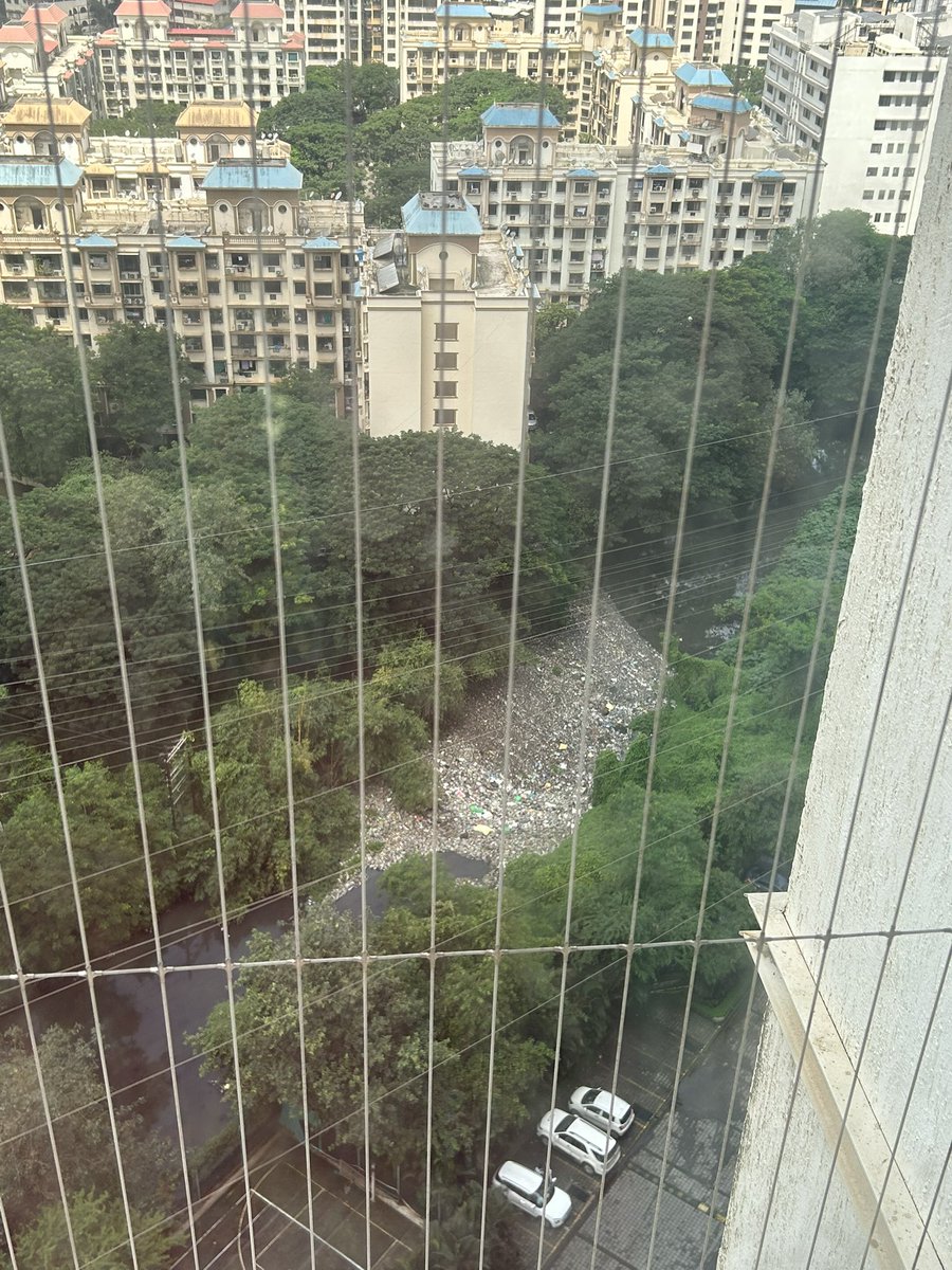 joshishwetap's tweet photo. Garbage has piled up in the nallah adjacent to Lodha Luxuria Complex , Majiwada , Thane , turning it into a mosquito breeding ground. Urgently needs cleaning to prevent health hazards . @TMCaTweetAway please take action. https://t.co/TIG4bsxEwX