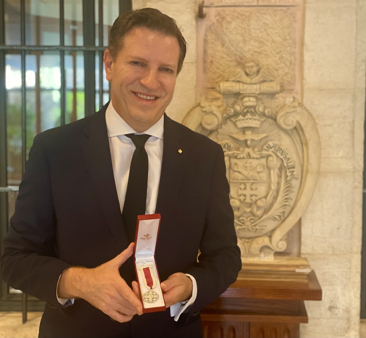 A blessing to be bestowed the Jerusalem Pilgrim's Cross, an honour of the Holy See awarded in the name of the Pope, by “the Franciscan Custody of the Holy Land” the official guardian of Christian holy sites on behalf of the Holy See in Jerusalem - with thanks to the Franciscans