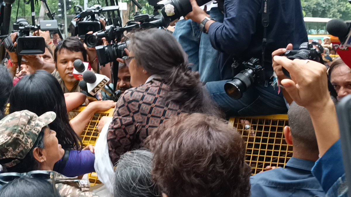 Women MPs climb the barricades as they were stopped from marching to the EC