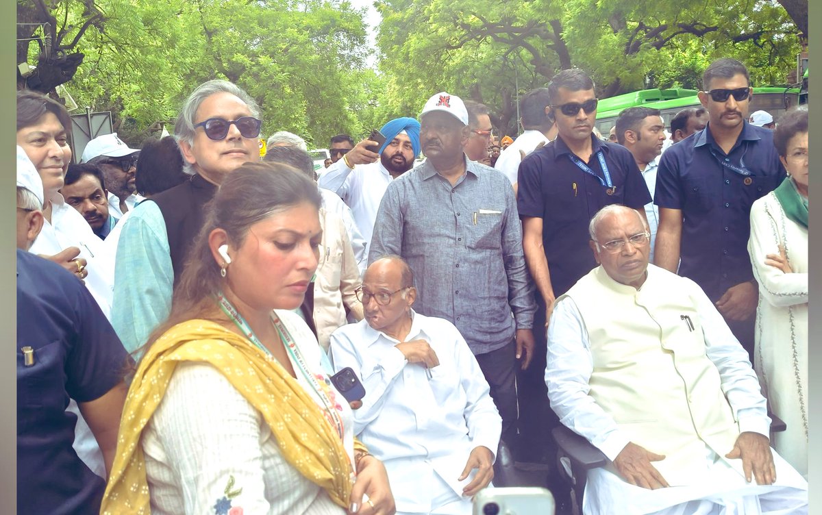 ShashiTharoor's tweet photo. At the INDIA bloc MPs’ protest today. We are all asking why @ECISVEEP could not give serious answers to the serious questions raised by @RahulGandhi, rather than insisting on formalities like an oath and an affidavit (when the data cited is all the EC’s own data anyway). It is very much in the interest of the Election Commission to dispel the doubts that have arisen in voters’ minds about the integrity and the credibility of the electoral process. The flaws pointed out could easily be addressed and answers given that could set rest any fears of voting-list manipulation. The nation is truly entitled to a response.