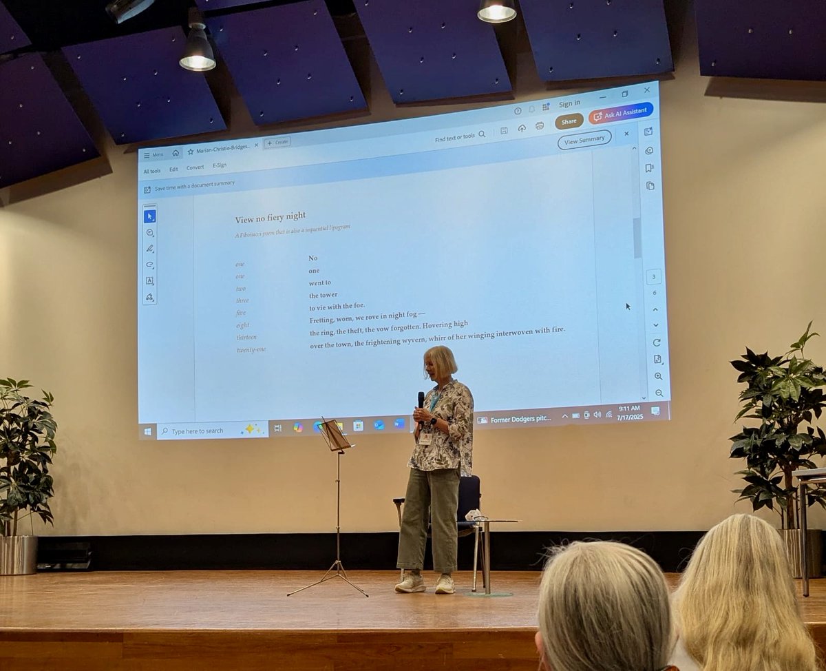 Here I am reading "View no Fiery Night" at the Bridges Poetry Reading (with thanks to <a href="/ClaraEtherin/">Clara Etherin</a> for the photo!)