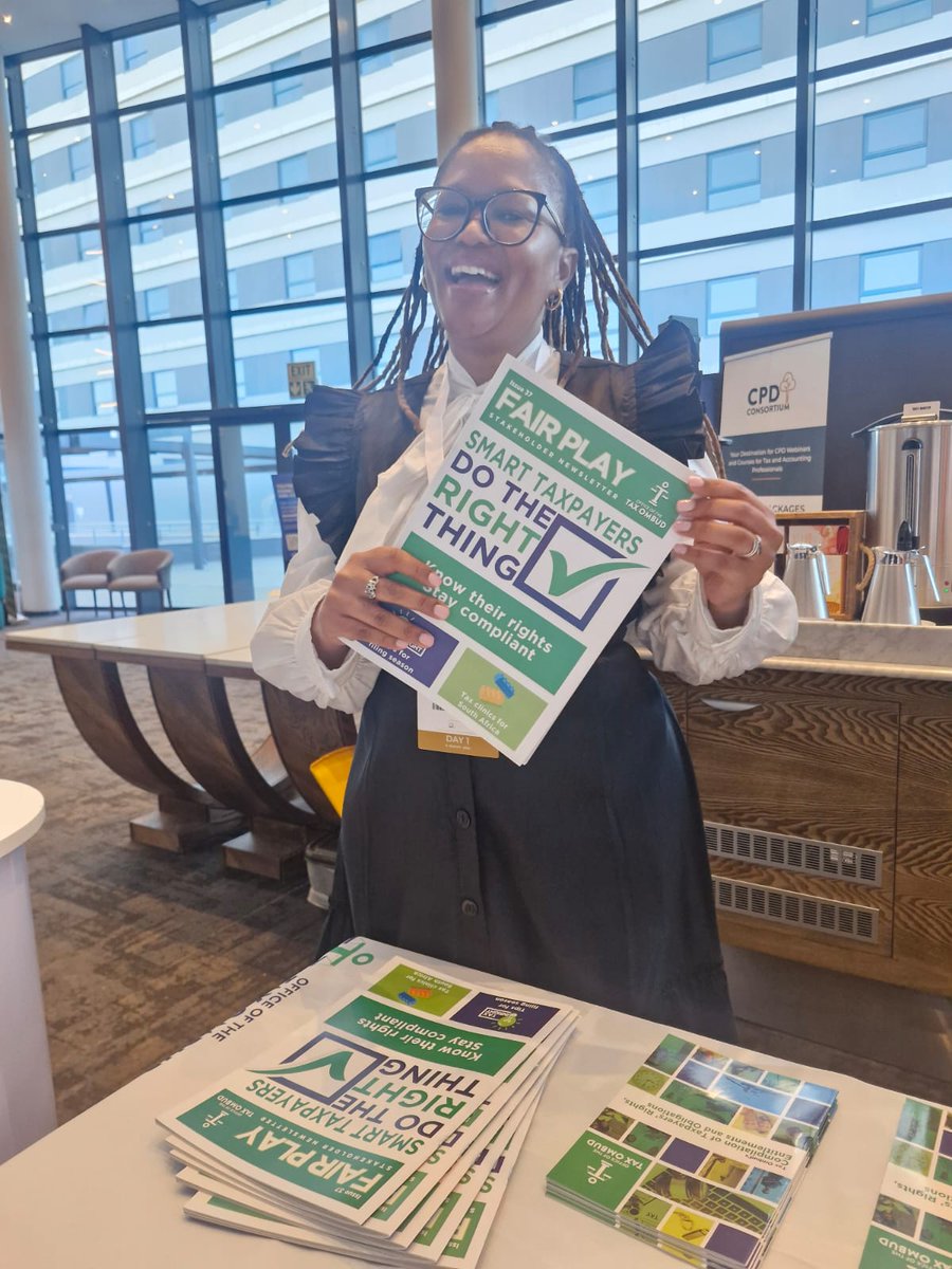 TaxOmbud's tweet photo. Acting OTO CEO @mmamelao enjoying the latest issue of the Office's Fair Play newsletter at #TaxIndaba2025, ensuring taxpayers and practitioners are kept informed about latest developments in the tax sphere. Visit our information desk for a free copy. #TaxOmbud #Filingseason #SmartTaxpayers #DoTheRightThing #Taxindaba #Taxaindaba12 #TaxIndaba2025