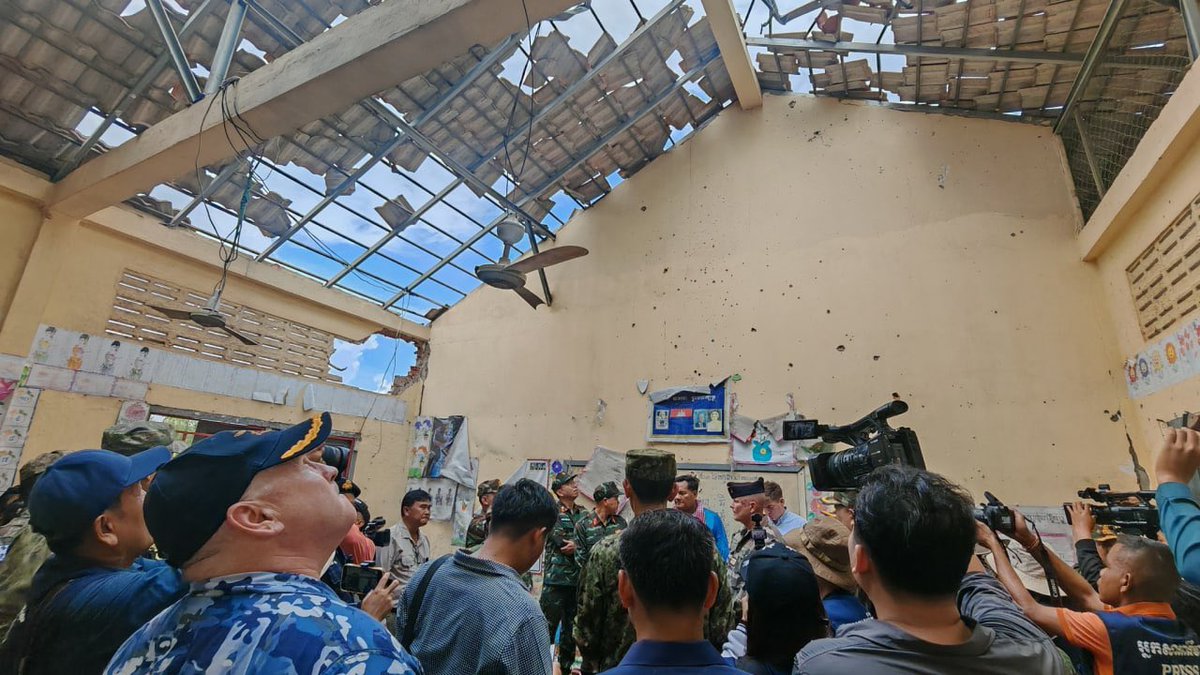 OBvlogs's tweet photo. The Military Attaché Corps Phnom Penh (MACPP), which comprises fourteen participants from nine countries, 

visited conflict-affected areas in Cambodia’s Banteay Ampil district on Sunday to inspect the situation on the ground,following Cambodia’s 

implementation the ceasefire. 
They visited the Ta Moan Senchey Health Centre, Ta Moan Senchey Primary School, and a nearby petrol station, all of which were destroyed by Thai bombings. Hong Raksmey