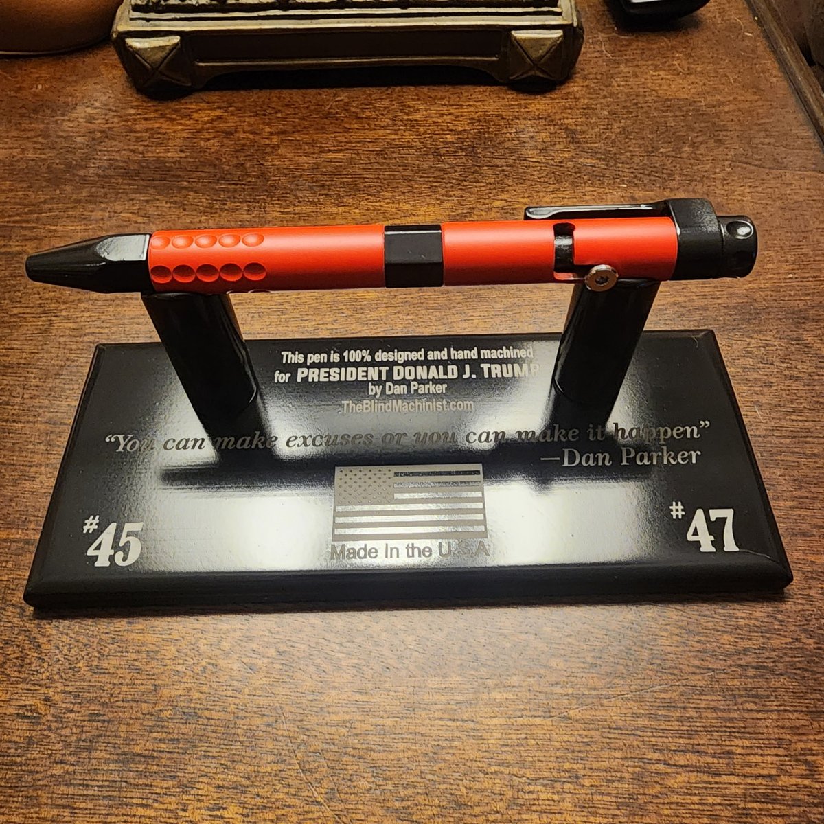 QuestfortheSalt's tweet photo. I am 100% blind. Here is a pen with base I hand machined for President Trump.  This is my "Made in AMerica" pen. I hand machined all 7 parts plus the 3 for the base. https://t.co/cQSBR3U5ZZ
