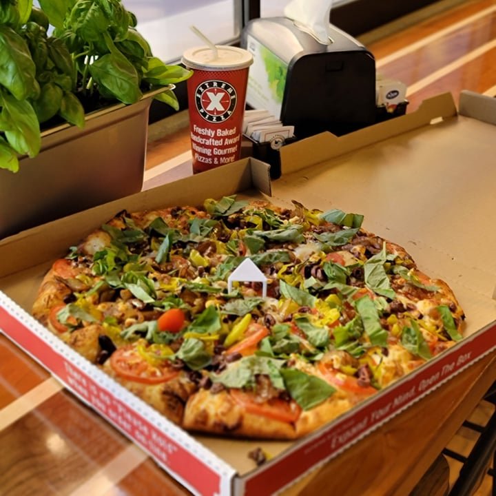 Pizza connoisseurs, we've got you covered! Order a handcrafted gourmet signature Extreme Pizza 🍕We'll add the freshest toppings and bake it to perfection.  Photo by Robert M. #ExtremePizza #pizza #pov #pizzadelivery #lunch #foodie #summer #pizzatime #mondaymood #monday #vibes