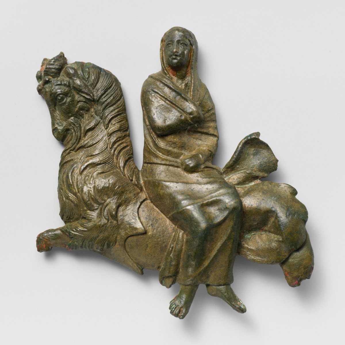 Bronze relief of a veiled woman riding a sea-goat, Greek, 4th century BC, Metropolitan Museum of Art.