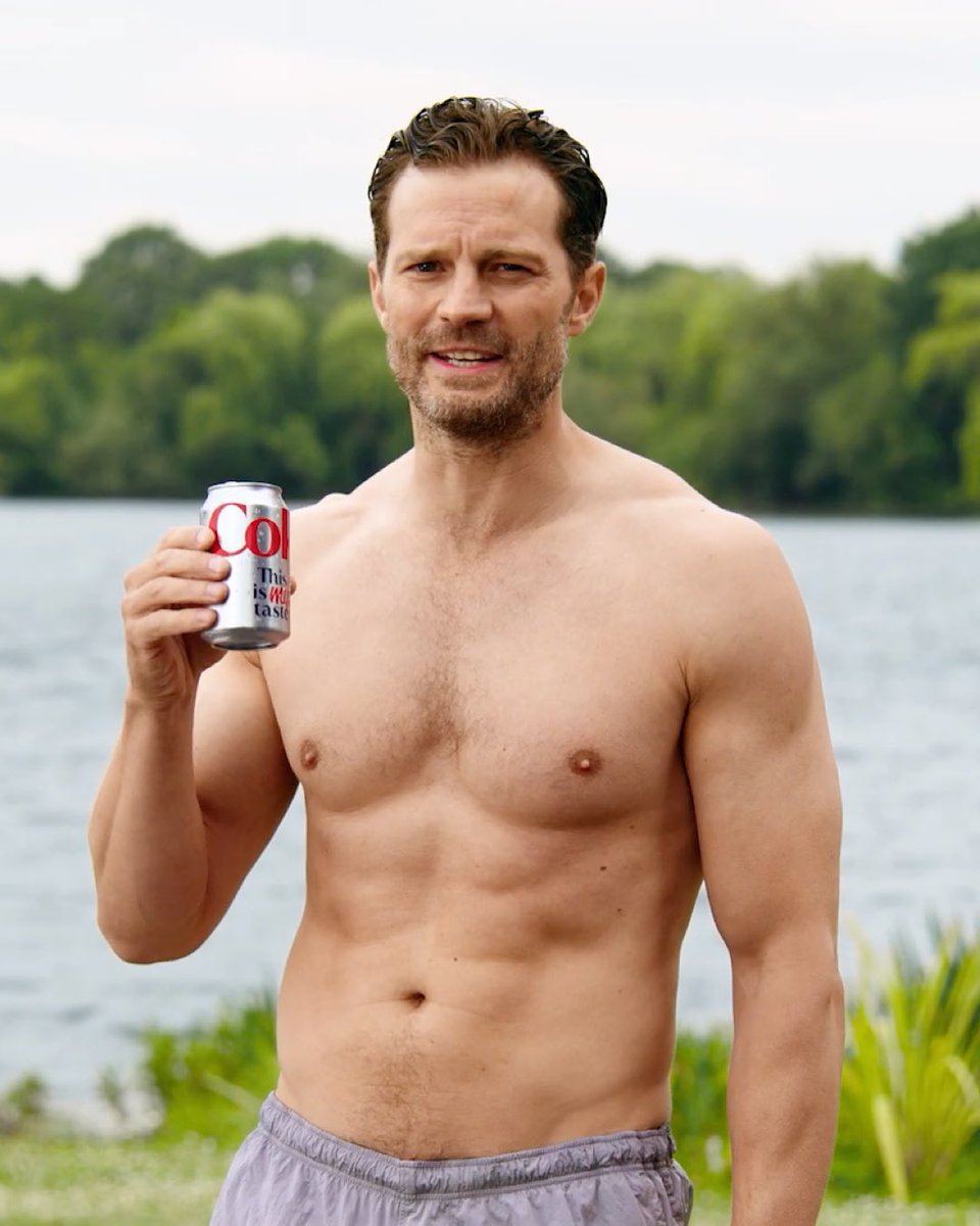 BuzzingPop's tweet photo. Jamie Dornan strips down for Coke campaign. https://t.co/uxGUTsPcGV