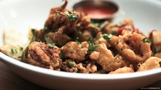 Craving calamari? 🦑 Dive into our Calamari Three Ways at SBC Restaurant and Beer Bar! Choose from classic crispy, Z-Bar-tossed, or Buffalo Dry Rub. Each with a unique dip to tantalize your taste buds! 😋 #SeafoodLovers #SBCFlavors