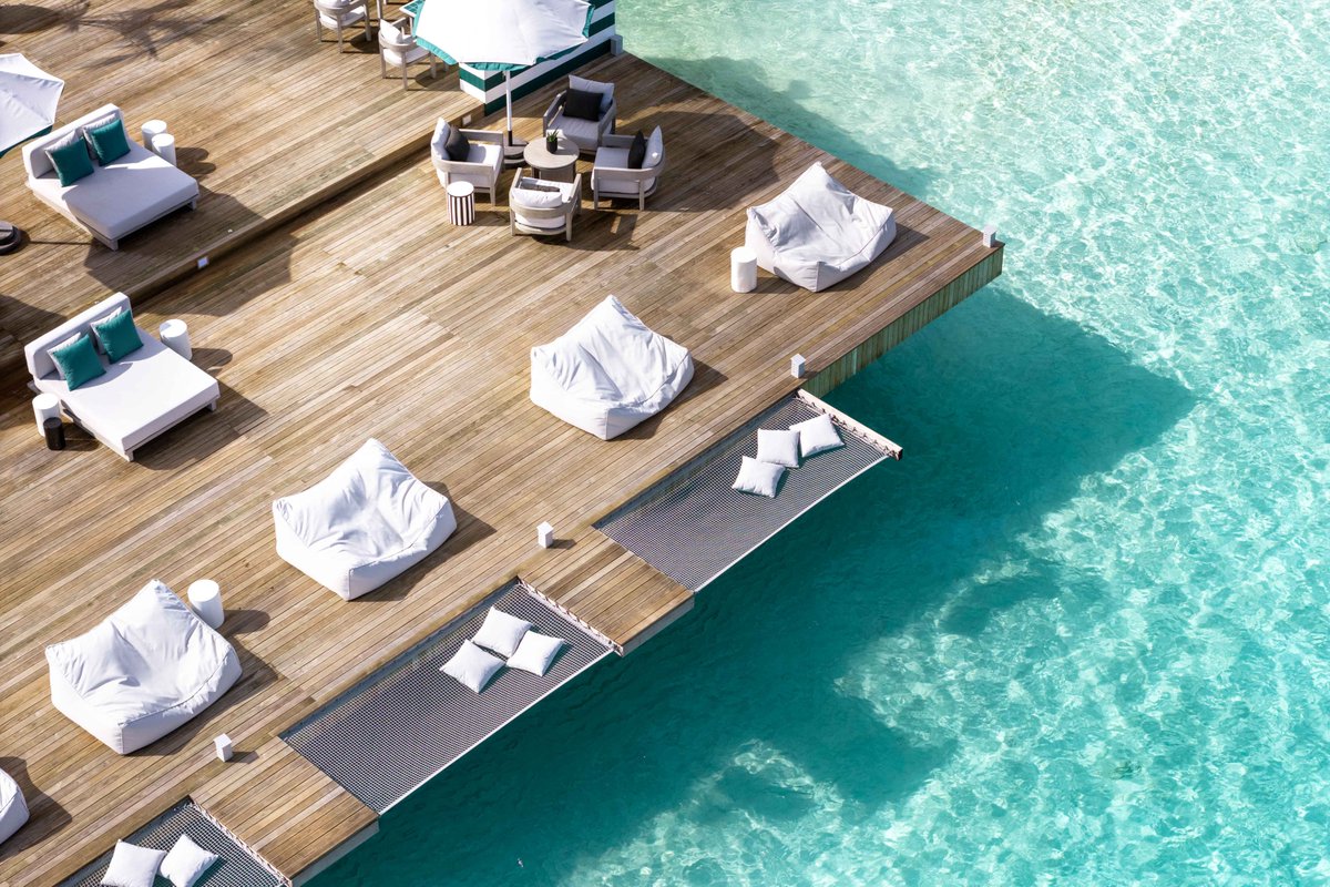 sunsiyamresorts's tweet photo. Perched above the turquoise waters of the Maldives, the Nautilus Bar at Sun Siyam Vilu Reef is more than a place to enjoy a drink it’s a space designed for moments you’ll want to linger in.

Think elegant interiors, bespoke finishes, and uninterrupted ocean views that set the scene for pure relaxation.

Whether you’re here to unwind, connect, or simply enjoy the view, the Nautilus Bar welcomes you.

Discover more: https://t.co/hVvDZnAsXL

#SunSiyamViluReef #SunSiyam #Maldives