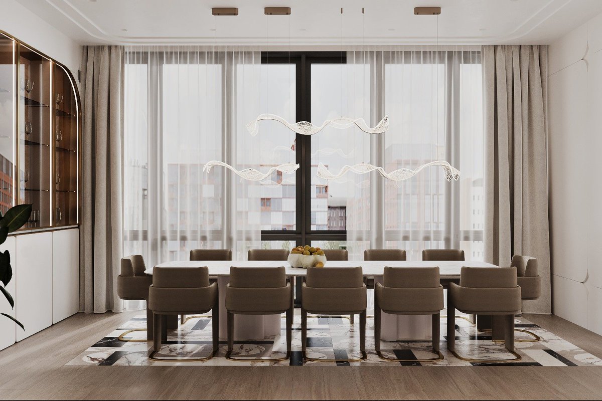 CSTERNDesign1's tweet photo. Elegance in Every Detail 🤍

Our client came to us with a clear vision: a space that felt elevated, refined, and timeless! with every detail carefully considered.

The result? This stunning dining room wrapped in soft neutrals, grounded by a custom-made china closet that blends beauty and function. Just steps away, a magnificent seating area featuring a rounded sofa and marble coffee tables creates a graceful transition from dining to lounging.

From materials to millwork, lighting to layout nothing was overlooked. This is quiet luxury at its best.

#RefinedLiving #DiningRoomDesign #CustomBuiltIns #NeutralInteriors #LuxuryDesign #EveryDetailMatters