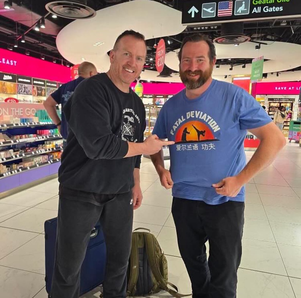 HairyBabyTees's tweet photo. ❤️ this. Friend of Hairy Baby David Brady traveling through the airport in his HB Fatal Deviation tee bumps into the one and only Jimmy Bennett star of the Irish cult classic martial arts movie. #legend #fataldeviation https://t.co/eKJtyK9SpJ