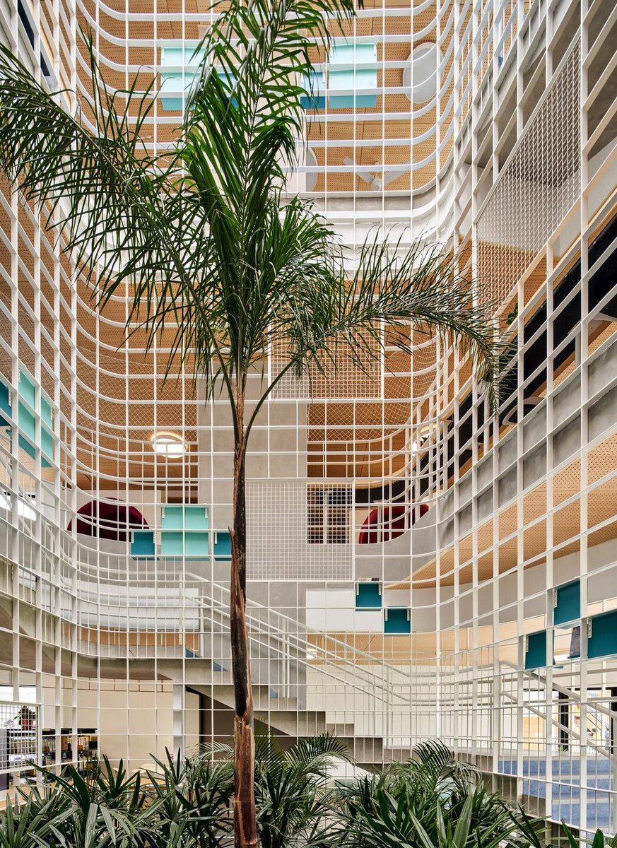 Archello's tweet photo. IDOM’s (@IdomGroup) Markham College Elementary School in Lima uses bamboo slats, natural materials, and climate-adapted terraces to merge learning with nature.
https://t.co/ukXJzuGCvL
#SustainableArchitecture #BambooDesign #LearningLandscape https://t.co/pSFXtmUKMG