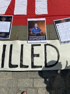 swilkinsonbc's tweet photo. Humanitarians hold a vigil outside the racist @BBC headquarters over their indifference to the israeli murder of fellow journalist #anasalsharif https://t.co/INq8T5CCv3