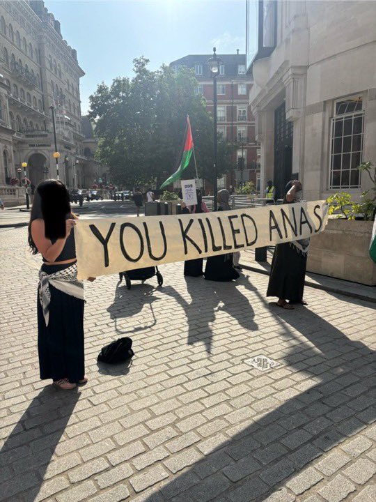 swilkinsonbc's tweet photo. Humanitarians hold a vigil outside the racist @BBC headquarters over their indifference to the israeli murder of fellow journalist #anasalsharif https://t.co/INq8T5CCv3