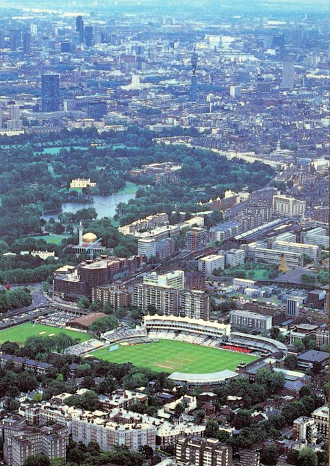 PictureSporting's tweet photo. Lovely long-distance aerial view of Lord's and Regent's Park taken at the time of the Bicentenary Test in 1987. The red temporary seating in front of the Tavern Stand was added that year to counter rowdiness in one-day games and was made permanent in 1988 https://t.co/h70w3EtAyT