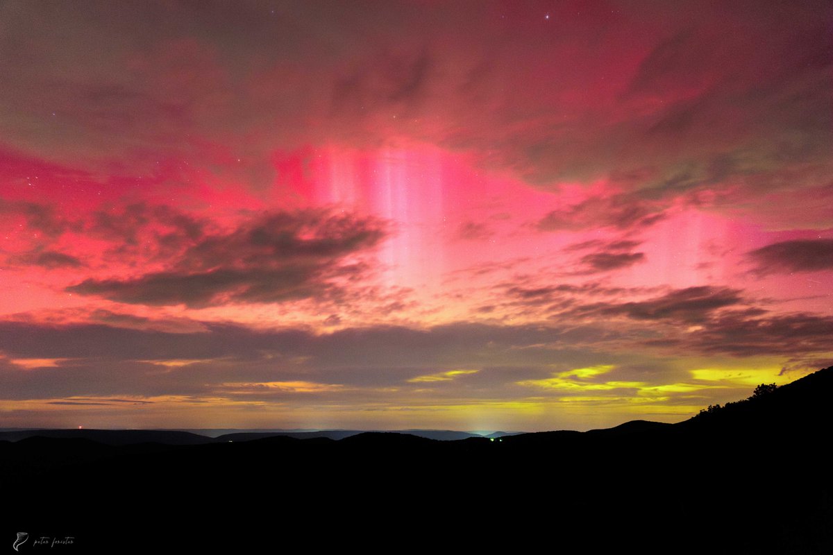 A year ago tonight. Partly cloudy G4 aurora over Shenandoah National Park, VA