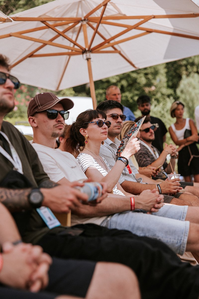 Audience watching panels at DeFi Summer Day