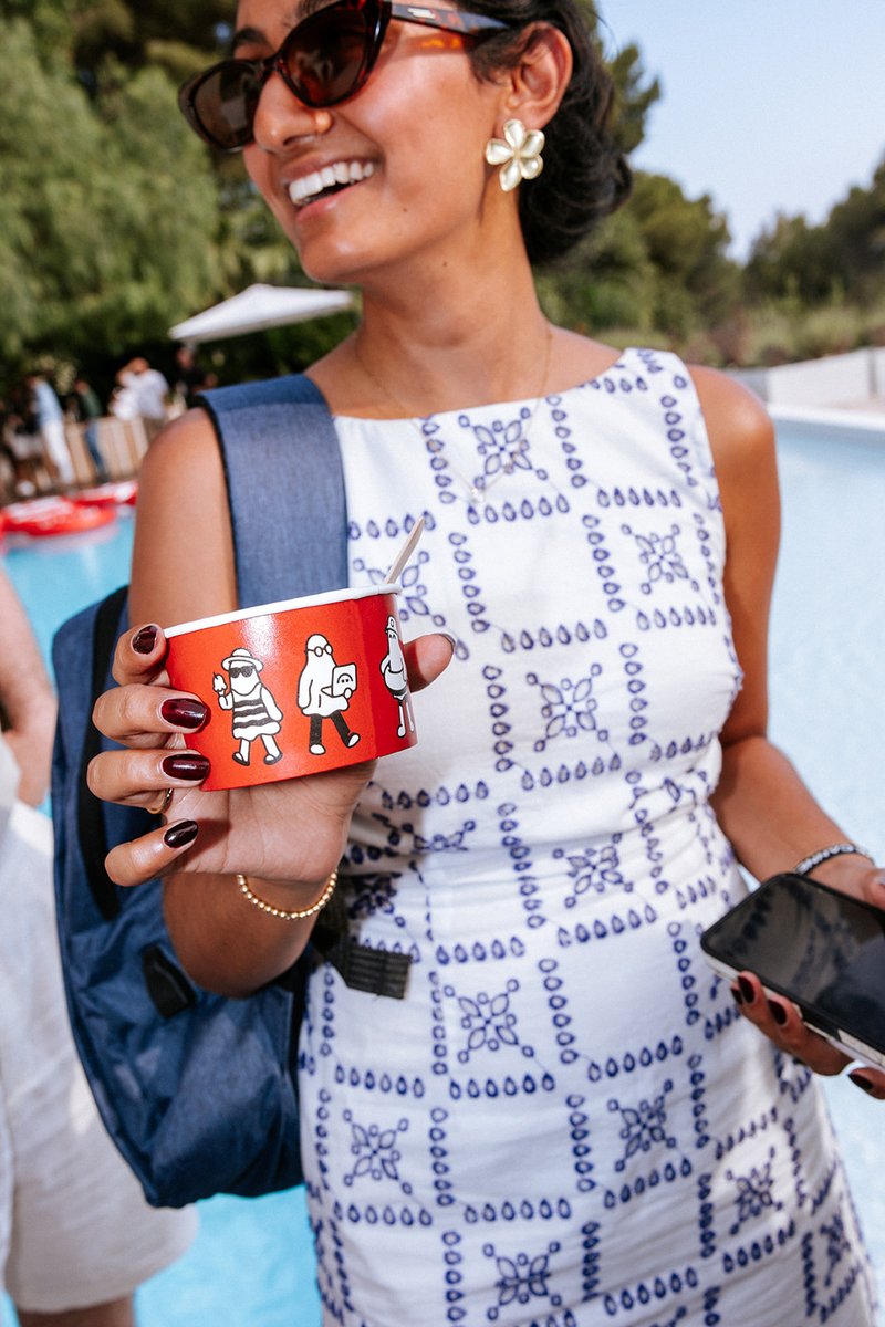 Attendee enjoying ice cream at DeFi Summer Day event