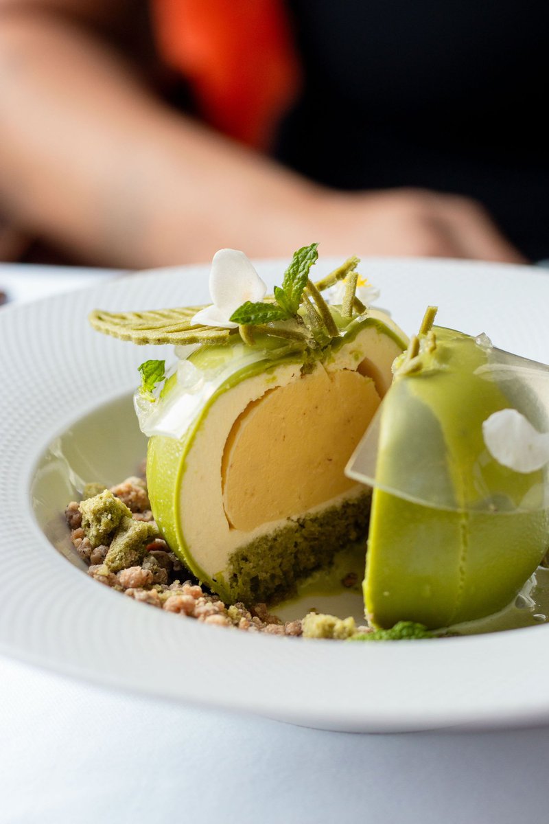 Swipe left to cut into this delicious matcha dessert…
Made with:

•  Citrus curd (lime &amp; calamansi) 
•  Yuzu mascarpone mousse
•  Matcha white chocolate coating
•  Matcha sponge
•  Yuzu veil
•  Black lime matcha crumble
•  Matcha creme anglaise 
•  Matcha tuile