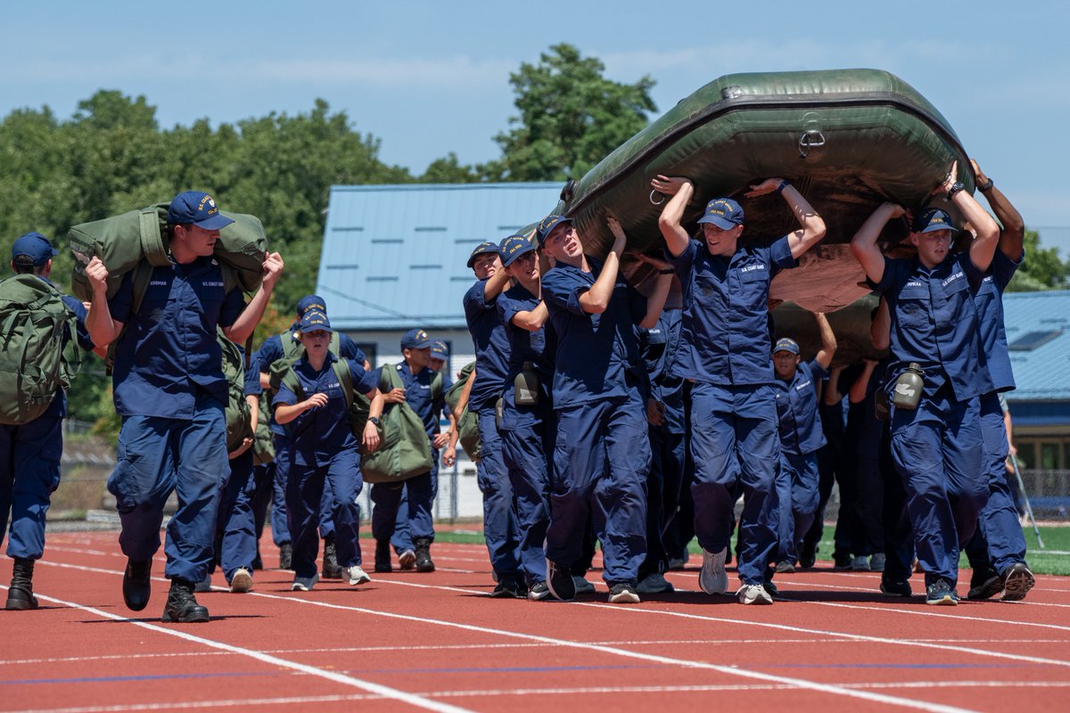 USCGAcademy's tweet photo. Sea Trials ended under the blazing sun with swabs hauling rafts around the track, proving their grit and teamwork. Next up: the Shoulder Board Ceremony!
#SwabSummer #USCGA #Classof2029 https://t.co/t4GU2DgtPG