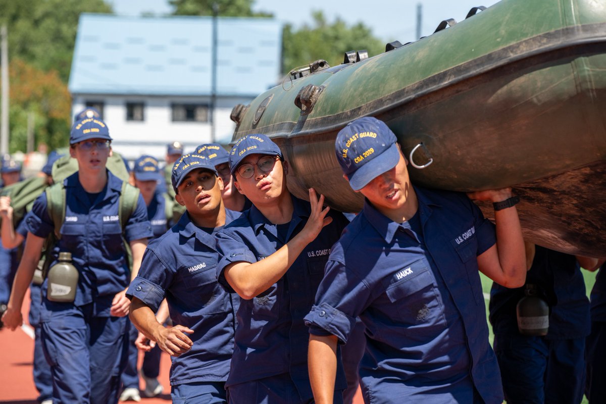 USCGAcademy's tweet photo. Sea Trials ended under the blazing sun with swabs hauling rafts around the track, proving their grit and teamwork. Next up: the Shoulder Board Ceremony!
#SwabSummer #USCGA #Classof2029 https://t.co/t4GU2DgtPG