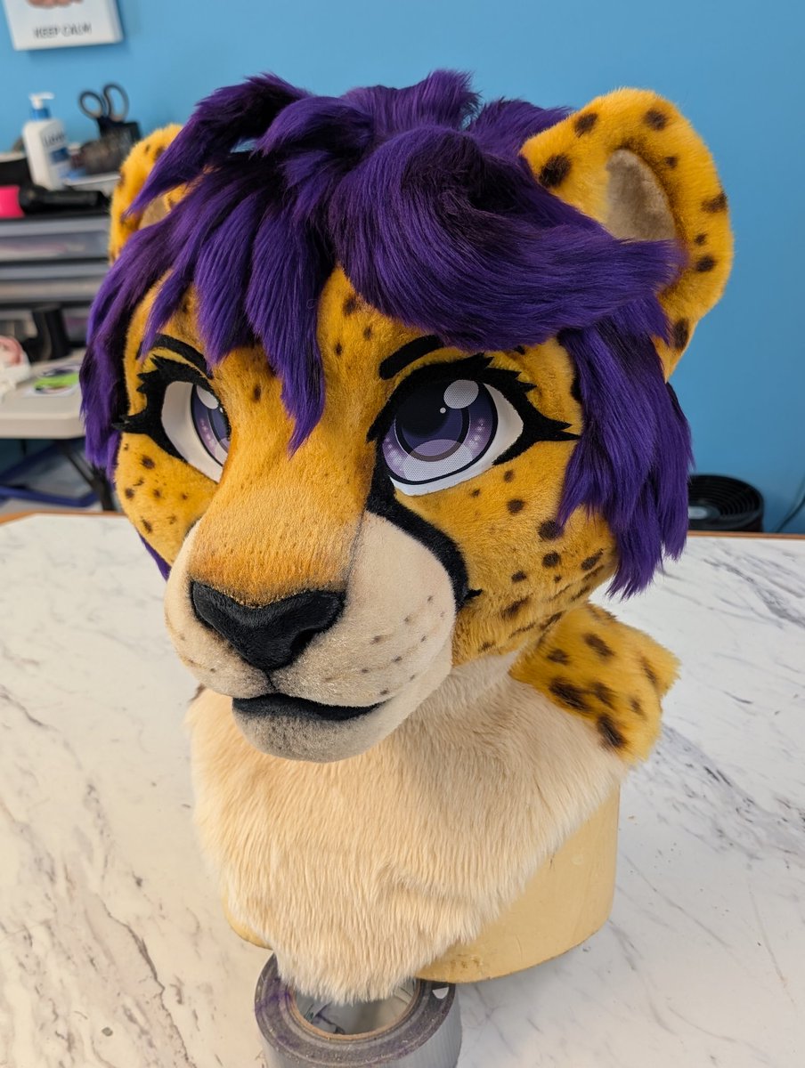 Here she is all airbrushed! I'm still working on the inside but I'm thrilled with how the painting turned out. :D And yes the suit can be washed, it will not come off with water.

#fursuit #costume #stuffedpandastudios #cheetah