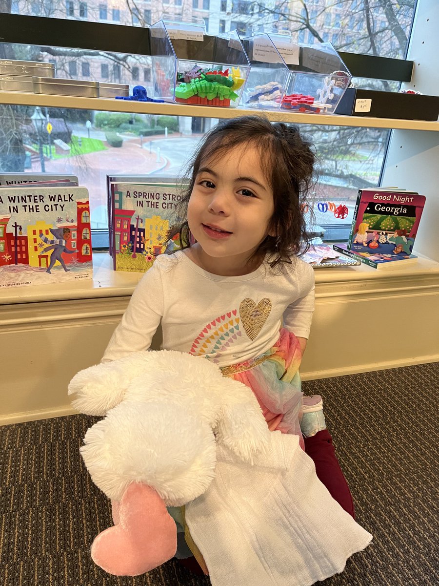 FishmanCathy's tweet photo. Nothing cuter than a granddaughter smiling at books written by her grandmother. https://t.co/mKv0RBau2g