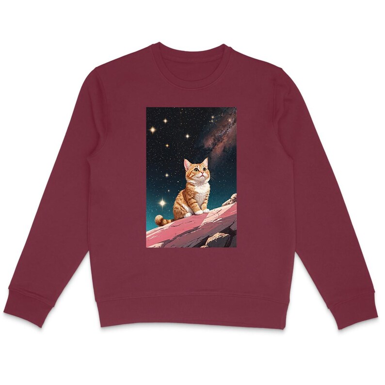 Look up, stay cozy. This lightweight organic cotton sweatshirt features a curious orange tabby cat gazing into the universe. Perfect for cat lovers who want style and comfort. Grab yours now!
👉 etsy.me/46OayeN