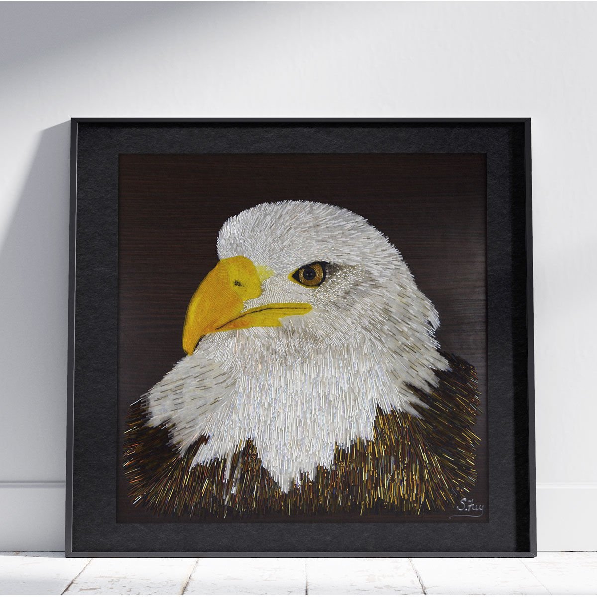 Sabrina Frey set out to capture the majestic beauty of our American Eagle, and we think her magnificent mosaic, "Spark," has done just that. According to the artist each seed and bugle bead was individually placed on its repurposed cabinet door background! firemtn.co/3V2lG0d