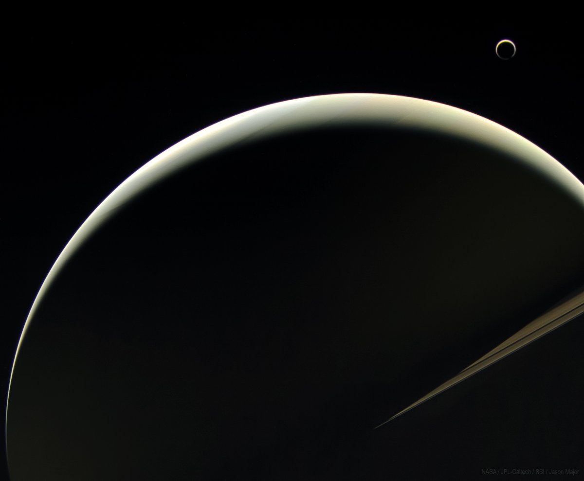 Saturn and Titan imaged from the planet's night side by <a href="/NASA/">NASA</a>'s Cassini spacecraft on August 11, 2013