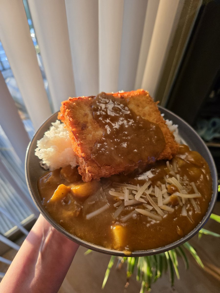 VickyChaiTea1's tweet photo. I made Japanese curry with tofu katsu and it was BOMB. I added potatoes and vegan cheese to the curry. Mildly spicy, really hit the spot. https://t.co/AUw38ttbyc