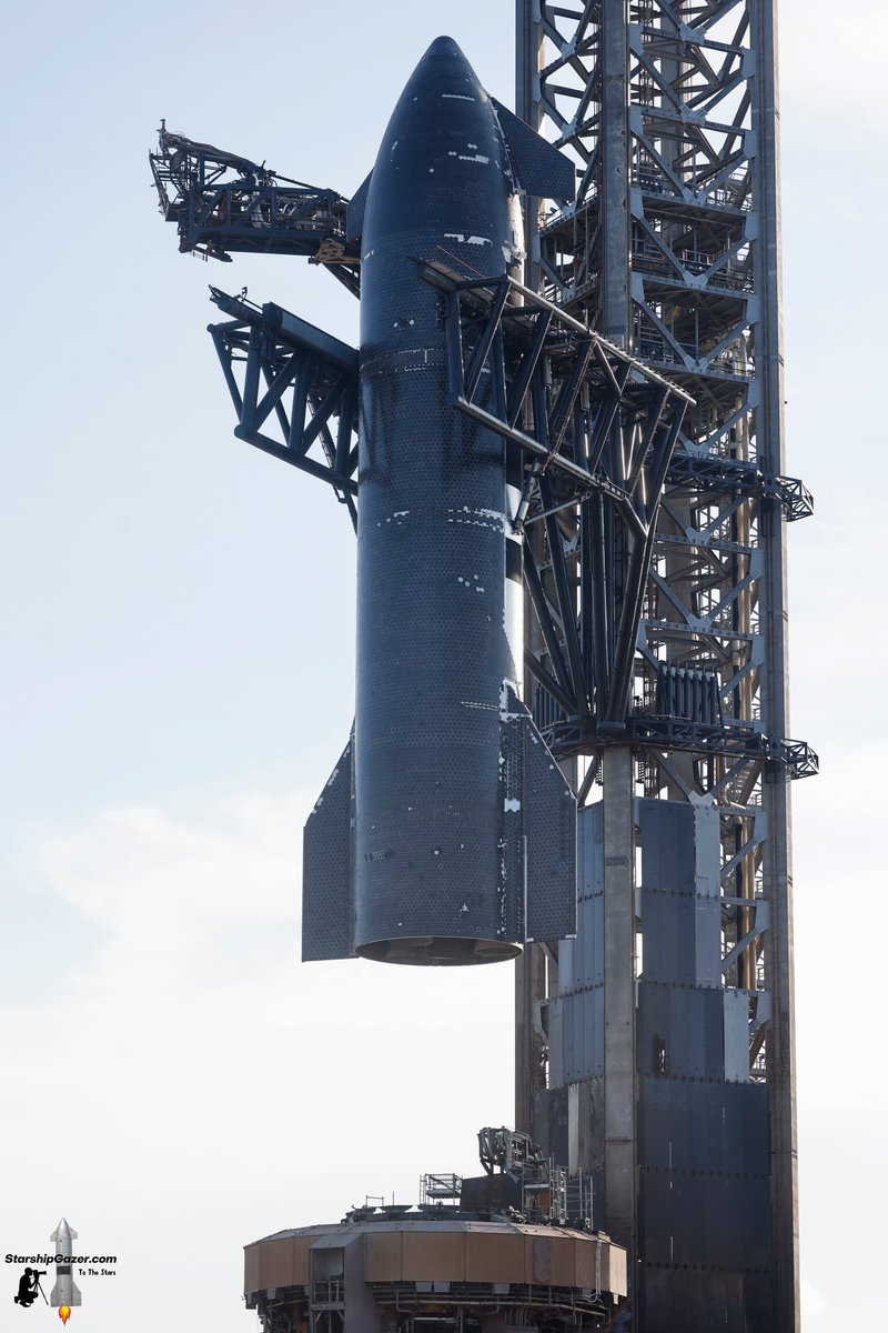 StarshipGazer's tweet photo. Starship 37 has been lifted onto the pad 1 launch mount ship static fire adapter for additional engine testing scheduled to occur as soon as 4 pm tomorrow. 

8/11/25 https://t.co/AOEotHI0ln