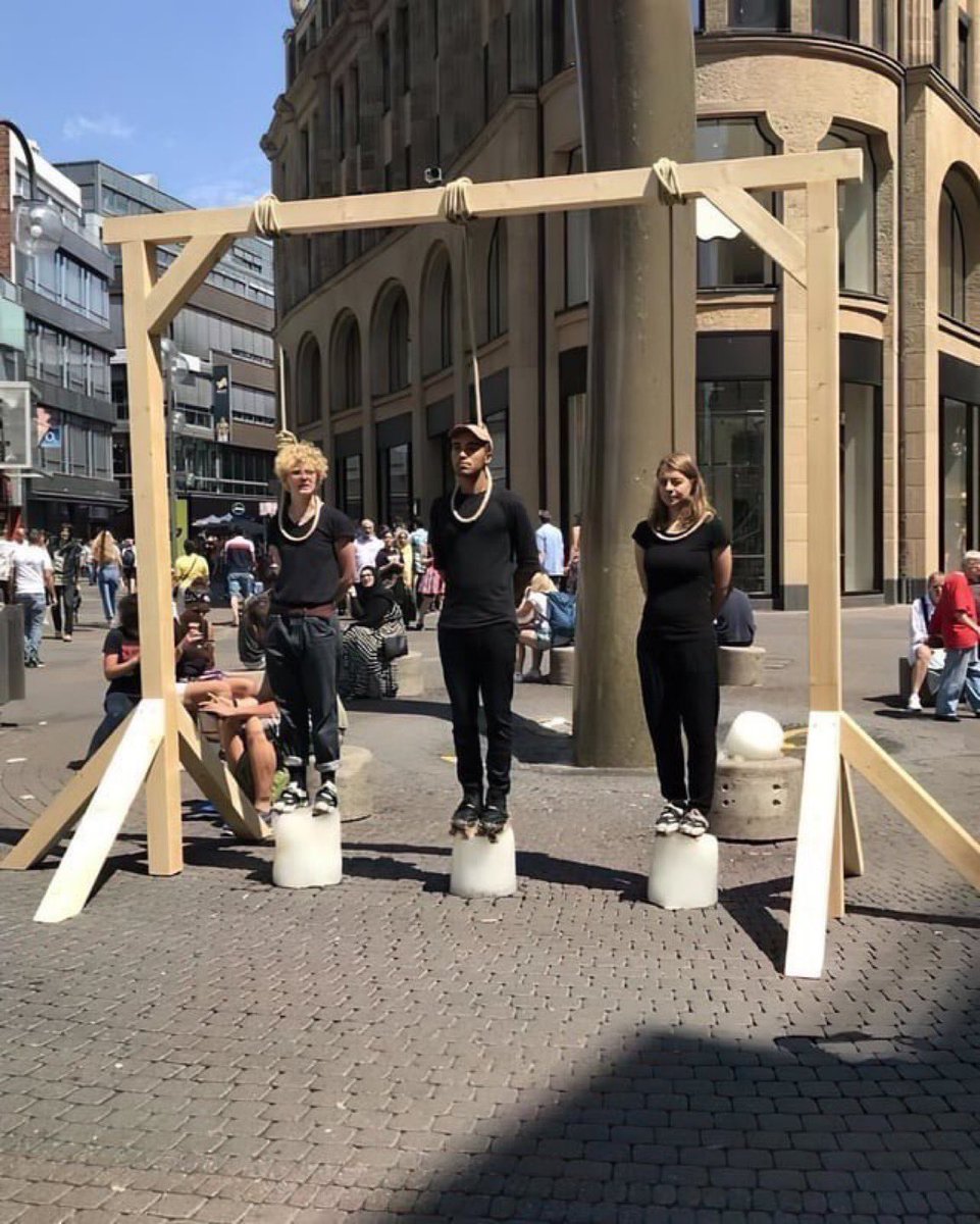 magafan1776's tweet image. Global warming activists standing on ice with nooses around their necks 🫠