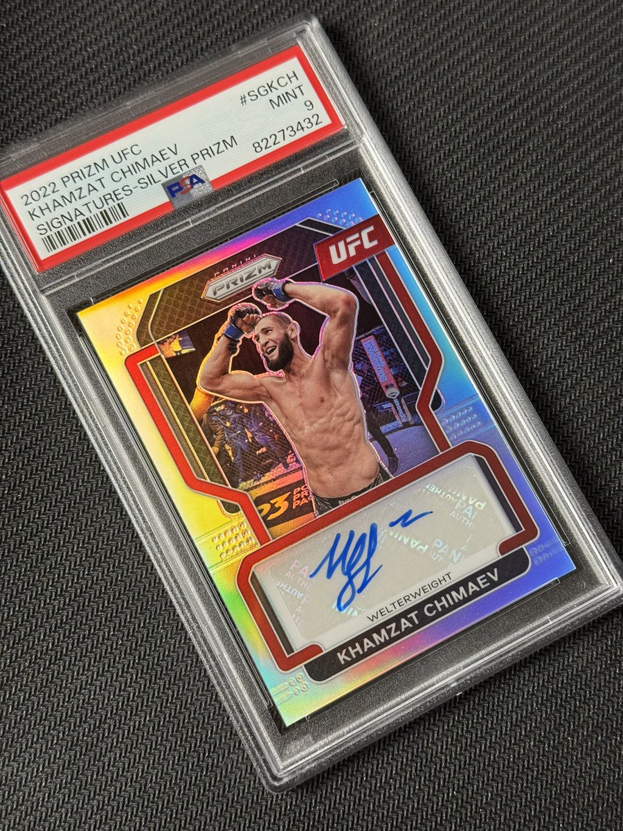 GoldenOctagon's tweet photo. 2022 Panini Prizm UFC - Khamzat “Borz” Chimaev - Signatures - Silver Prizm - PSA 9 - Khamzat’s 1st Auto from any UFC product.
_________________
#ufc #ufc319 #ufccard #paniniprizm #prizm #sportscard #collection #auto #autograph #silverprizm #khamzat #khamzatchimaev #psa #borz https://t.co/O27liFbC9P
