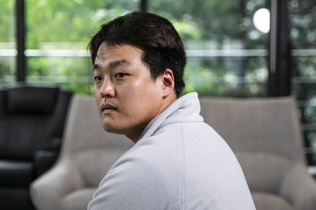 Profile photo of Do Kwon looking sideways in a casual setting