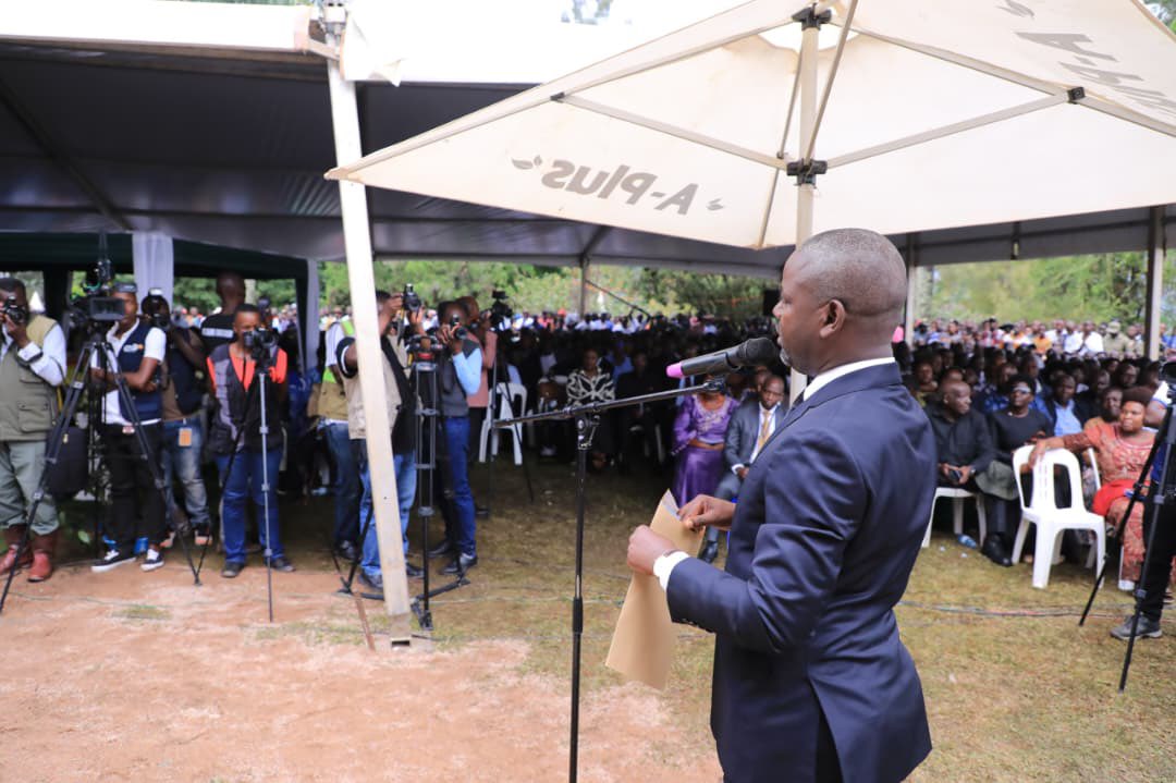 Thomas_Tayebwa's tweet photo. Together with my wife, I joined mourners from across the political divide at the burial of James Garuga Musinguzi in Kanungu District yesterday, where I represented H.E. @KagutaMuseveni. The President described Garuga’s death as a great loss to the nation, the people of Kanungu, and the business community. He noted that Garuga passed away at a time when the country needed him most.

The President praised Garuga as a man of hard work and humanitarian spirit, someone who set aside political affiliations to champion initiatives that benefited not only his community but the entire country. He commended Garuga’s investment in agriculture, which demonstrated his deep understanding and appreciation of the NRM mission of sustainability and self-reliance.

The President added that Garuga’s legacy will live forever in the hearts of those whose lives he touched.

On a personal note, I shared how I first met Garuga in 2005 and he went ahead to be my guardian. 
From the moment we met, he became a father figure to me and even supported me when I was getting married. He never asked for anything in return, only advising me to extend such generosity to others. When I later joined the NRM, he encouraged me to work for the people of my constituency and for the country, a commitment I continue to uphold.

One of the most important lessons we can learn from him is the value of establishing businesses that are purposeful and impactful. Garuga always sought to ensure that his enterprises served and employed ordinary people. We should emulate his example by ensuring our businesses benefit the everyday Ugandan.

May his soul rest in eternal peace.