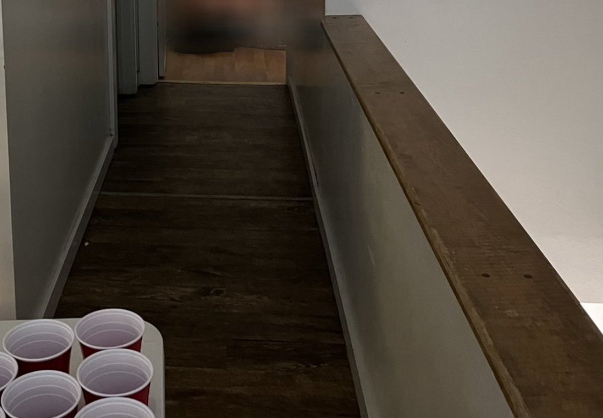 All these cans more than likely were sitting on the top banister and got knocked down when they or Xana were going back to her room. There’s a little more room on the banister side, tighter squeeze on the other end, but those cups aren’t moved on the table so all those cans on