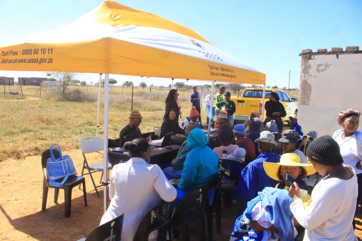 ANCParliament's tweet photo. [IN PICTURES] ANC MP Cde Christinah Tlhong, visited Madibe-Gakubu Village, one of the rural areas in Mahikeng. Upon her arrival she was warmly welcomed by the Traditional Authority of the village led by Tradditional Leader Kgosi Lekoma. 

During her visit, she brought essential services including a Home Affairs mobile unit and Sassa mobile services, to assist those who are unable to travel to the relevant offices for these services. Honourable Tlhong also engaged with the community on crucial issues, including the importance of Voter Registration. Additionally, she discussed the misuse of child support grants by parents emphasizing the need for responsible management of Social Grants.

Honourable Tlhong also requested Traditional Authority’s support in encouraging the community to register as voters and participate in the democratic process.

#VoterRegistration2025
#LeaveNoOneBehind
#ANCatWork 
#ConstituencyWork
