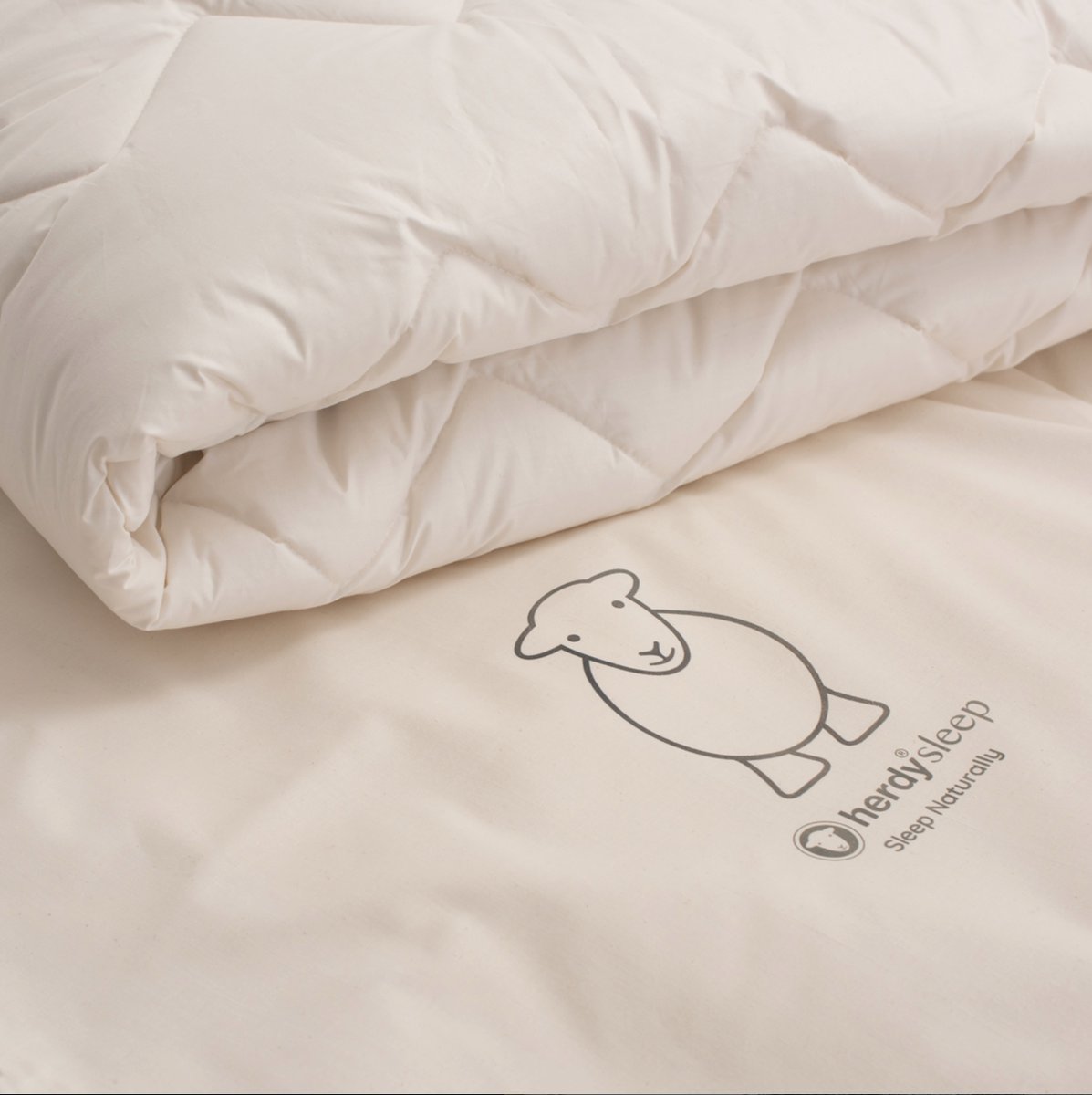 Too hot to sleep?  We've got ewe🐑
Struggling to sleep in the heat, you’ll love our wool summer #duvet
Synthetic fibres don’t breathe like natural wool does, as they’re prone to making you overheat, unlike wool, which naturally keeps you cool.
herdysleep.com/duvets

#heatwave